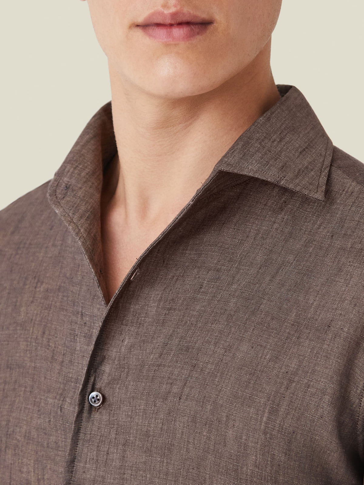 A close-up of the Chocolate Brown Portofino Linen Shirt, highlighting the one-piece collar and fine Italian linen weave.