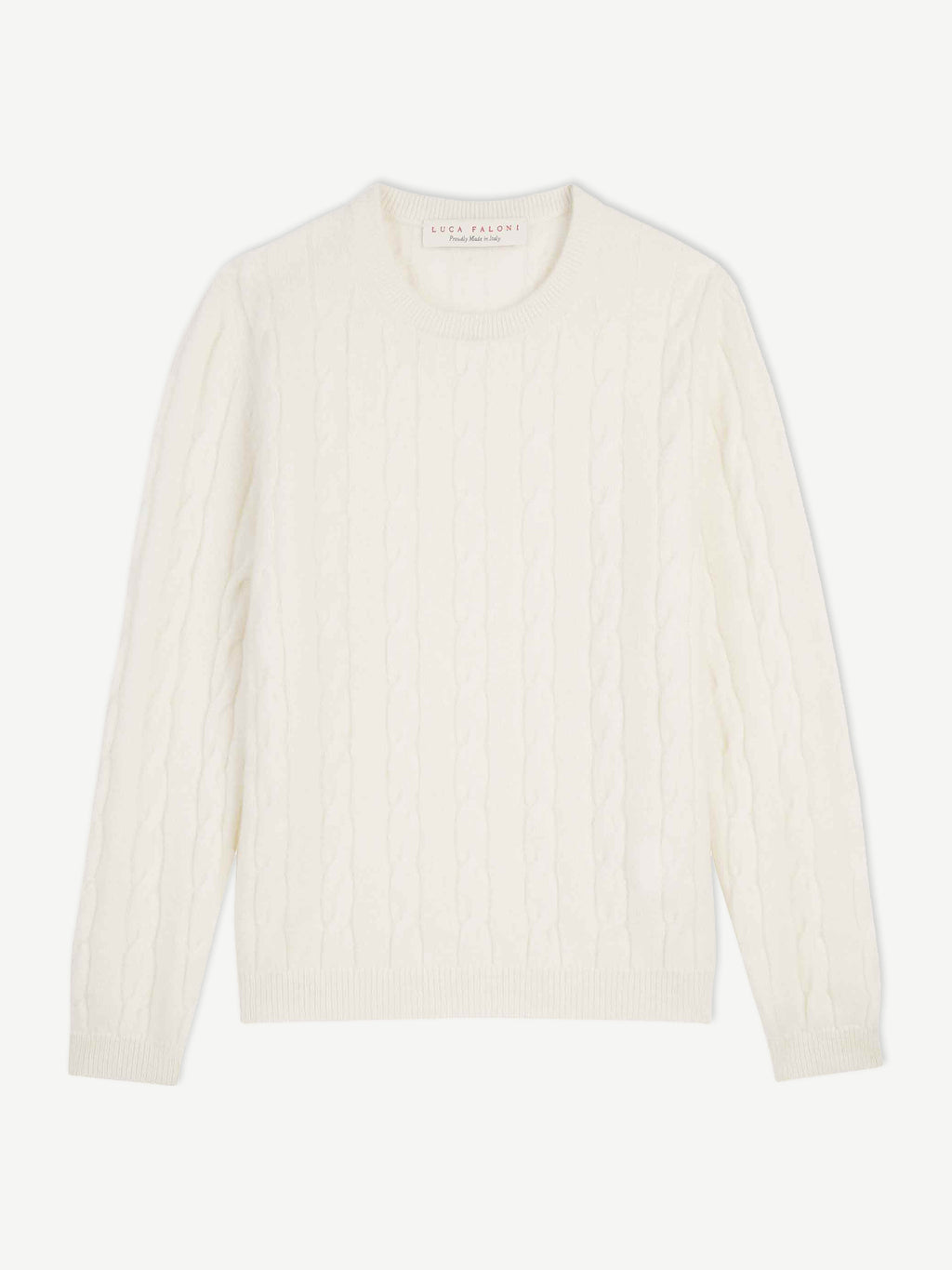 Front view of the white cashmere Junior Cable Knit sweater on a white background.