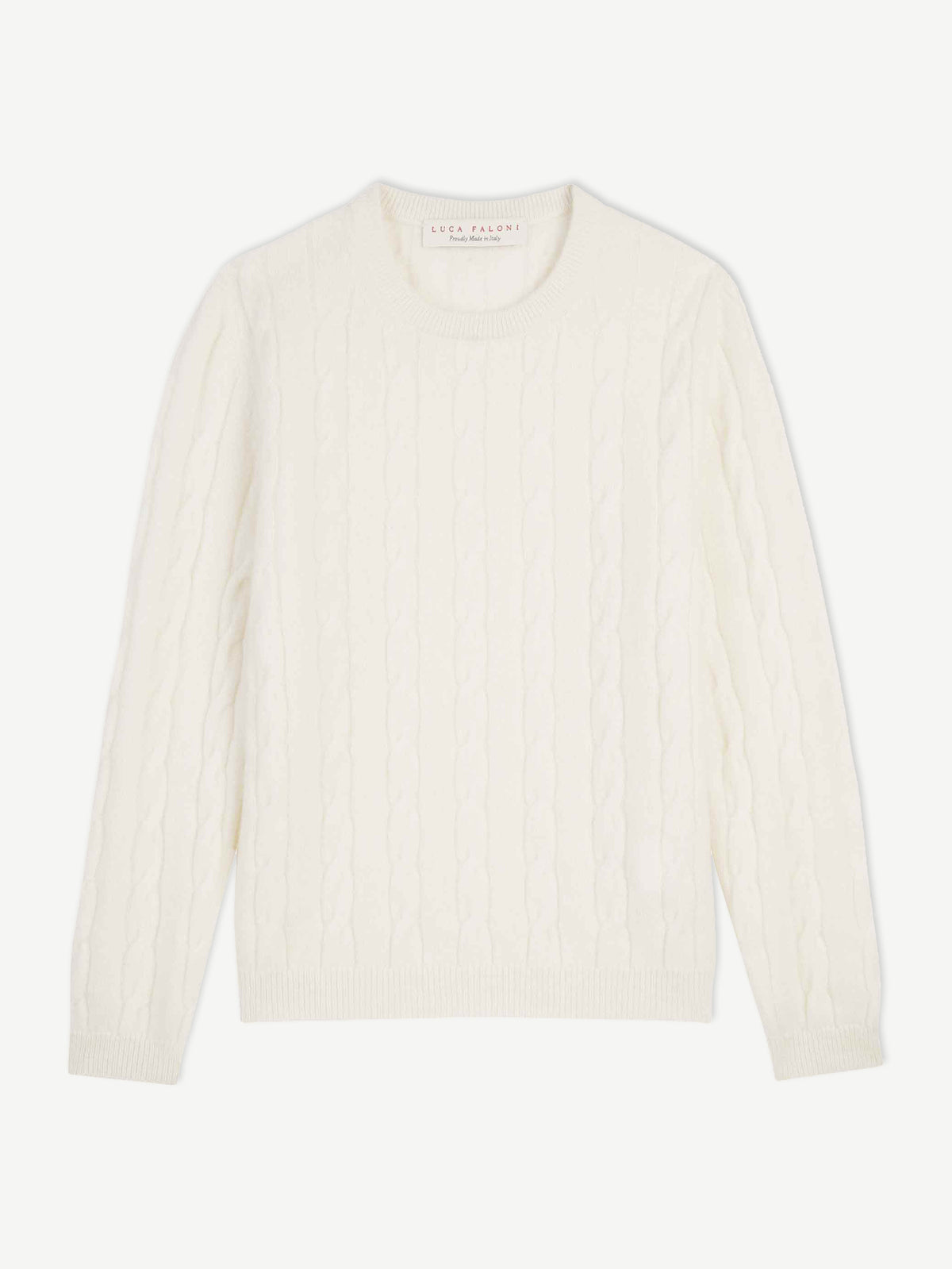 Front view of the white cashmere Junior Cable Knit sweater on a white background.
