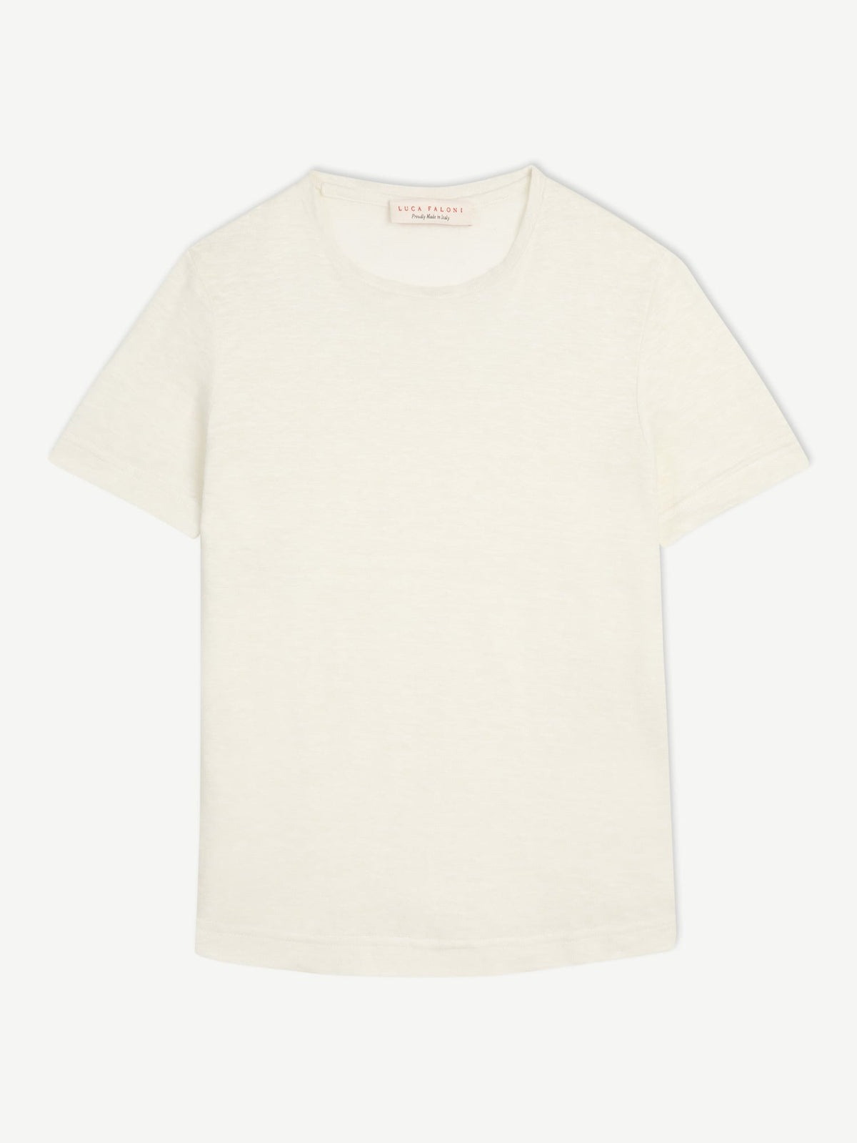 Flat lay of the off-white Junior Linen Jersey T-Shirt, highlighting its classic crewneck and soft, breathable linen fabric.