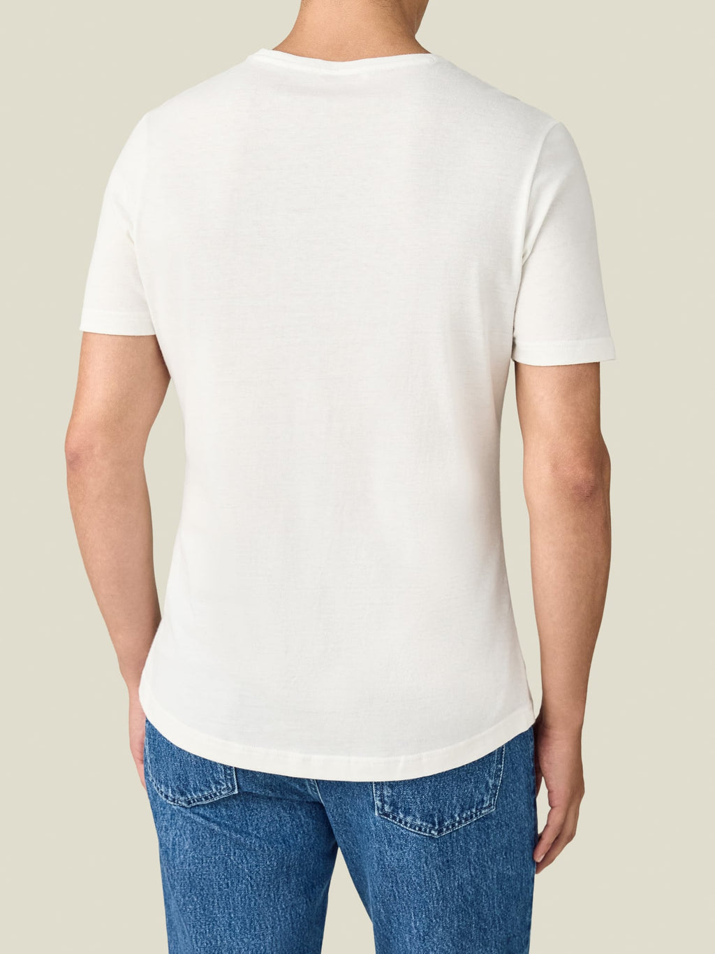 Back view of a model wearing the Luca Faloni Cashmere cotton T-Shirt in white.