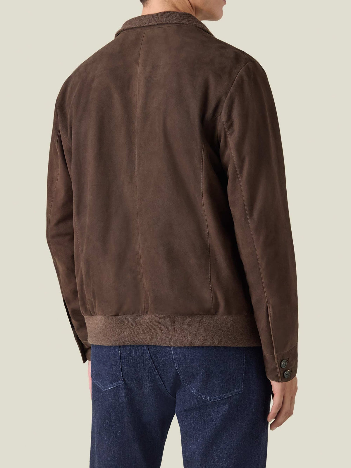 Back view of a man wearing the Luca Faloni Classic Bomber Jacket in chocolate brown suede.