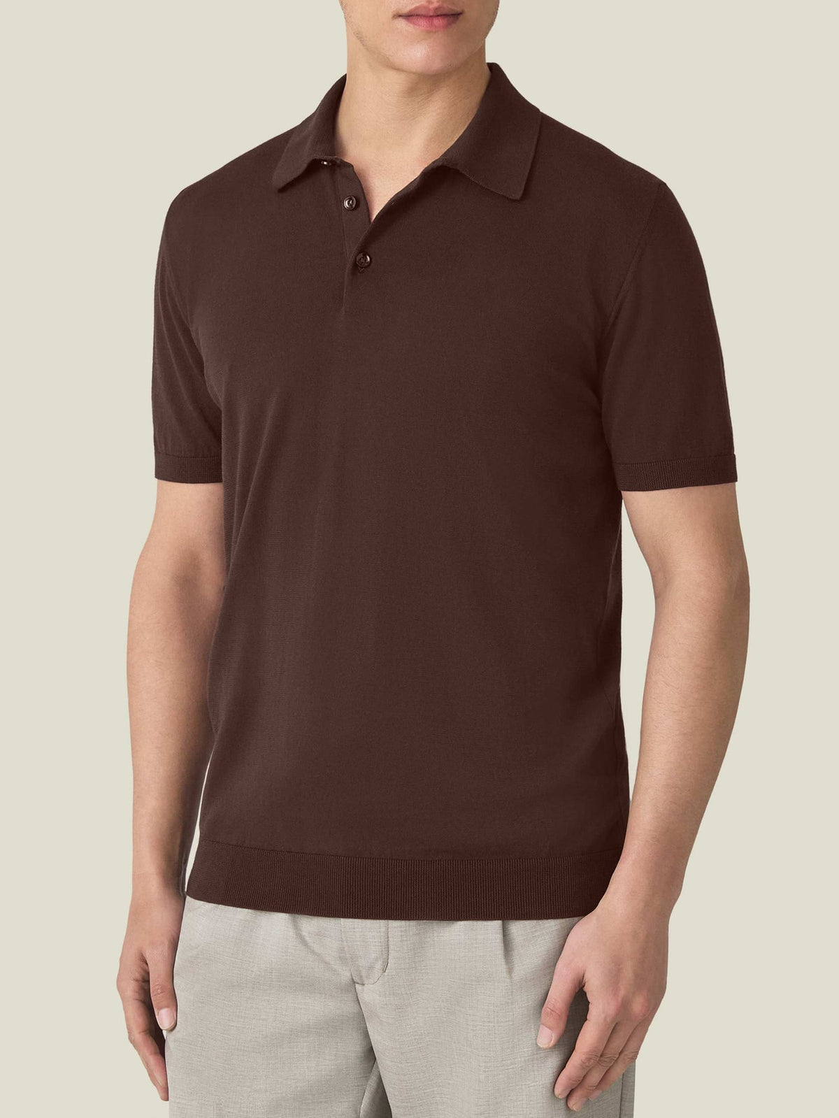 Front view of a model wearing the Luca Faloni Knitted Cotton Polo in Chocolate Brown.