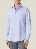 Front view of a model wearing the Striped Light Blue Lightweight Poplin Cotton Shirt.