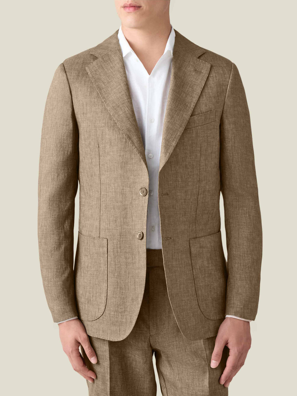 Front view of a model wearing the Luca Faloni Hazelnut Brown Linen Suit, showcasing the fit of the single-breasted blazer.