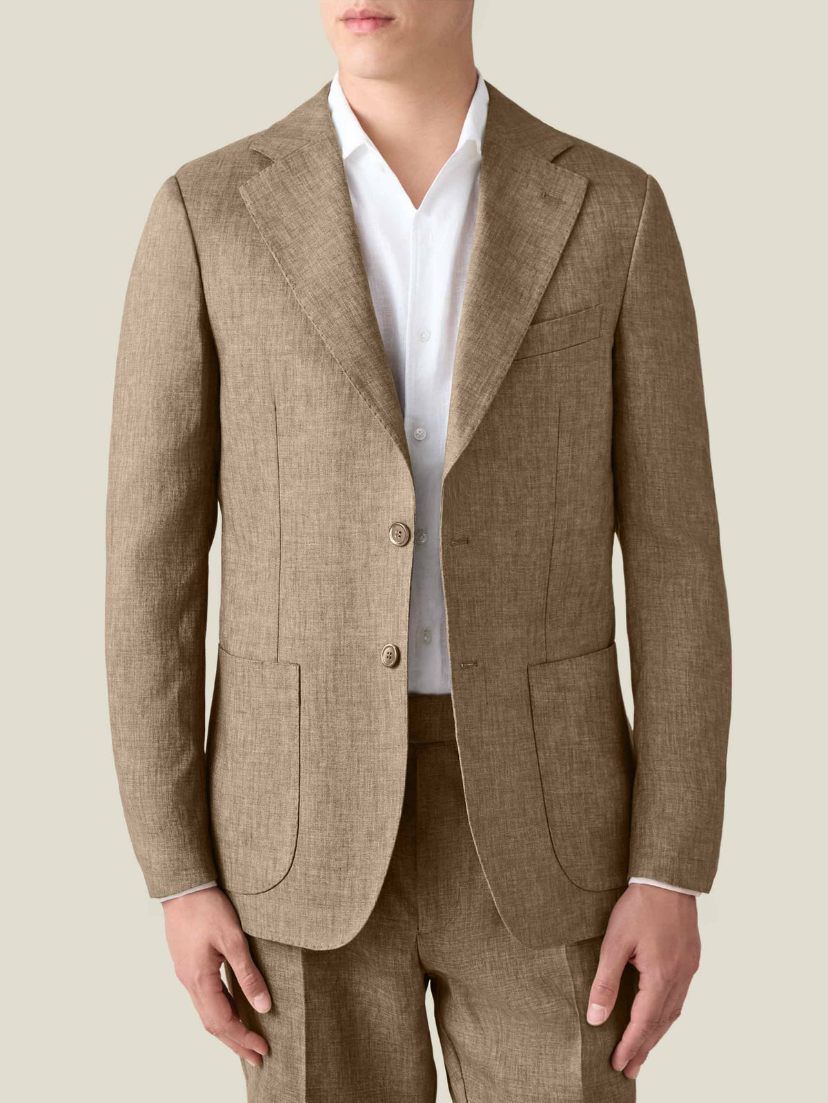 Front view of a model wearing the Luca Faloni Hazelnut Brown Linen Suit, showcasing the fit of the single-breasted blazer.