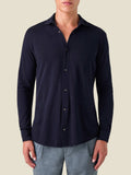 Front view of a model wearing the Silk-Cotton Piqué Shirt in Midnight Blue.