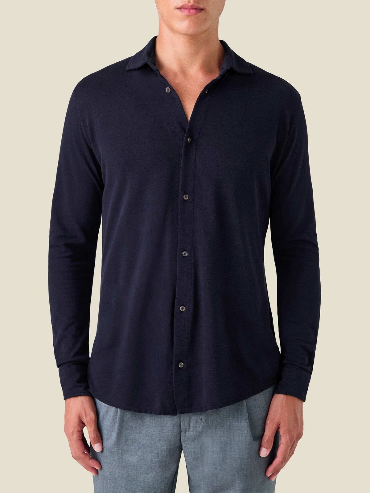 Front view of a model wearing the Silk-Cotton Piqué Shirt in Midnight Blue.