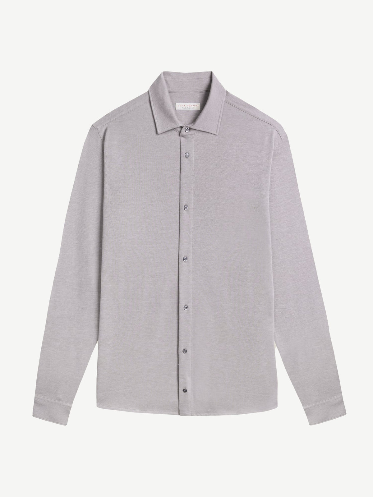 Front view of the light grey Silk-Cotton Piqué Shirt, laid flat to display its cutaway collar and long sleeves.