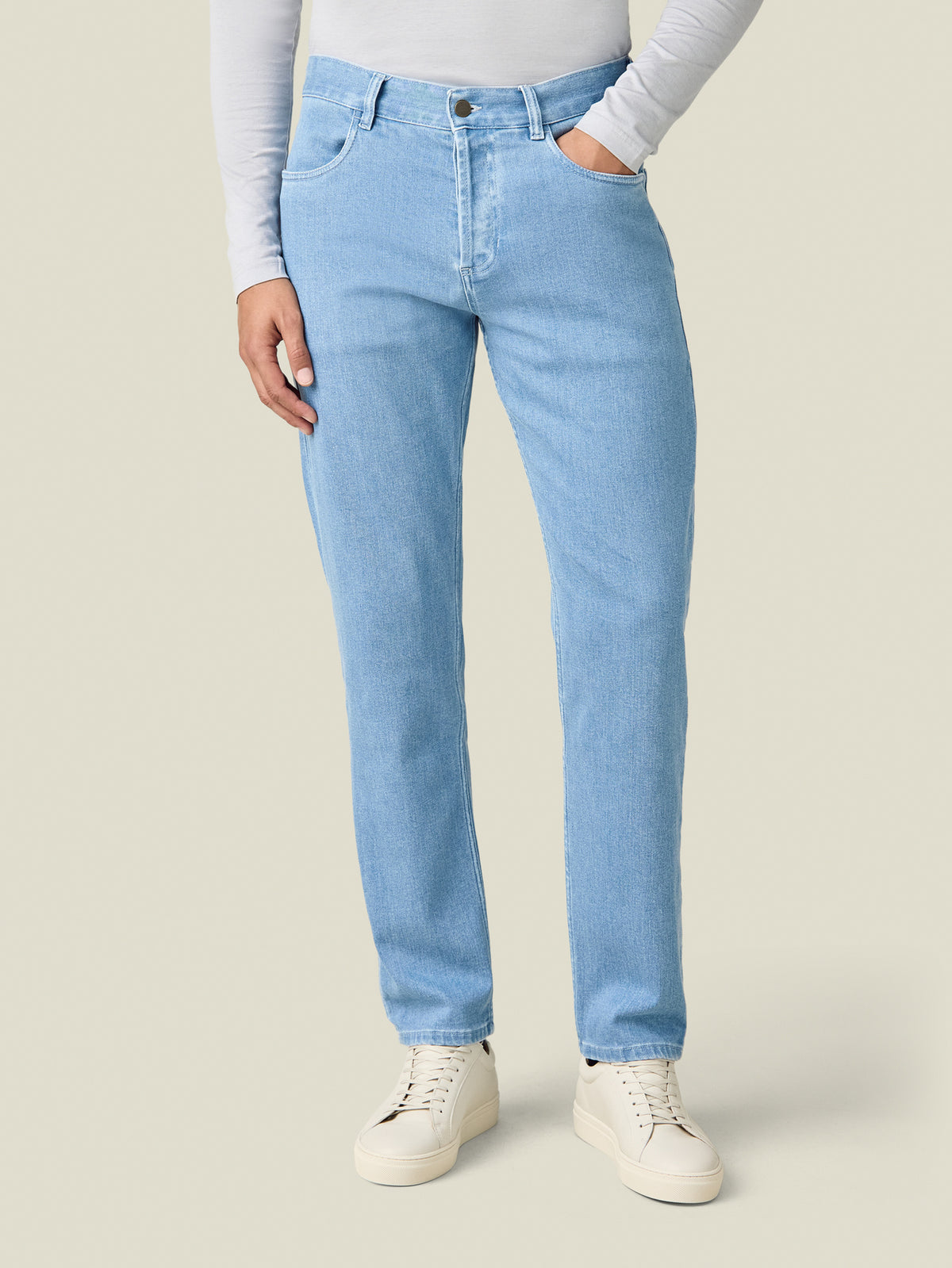 Front view of a model wearing the Luca Faloni Cashmere Denim Jeans in light blue.