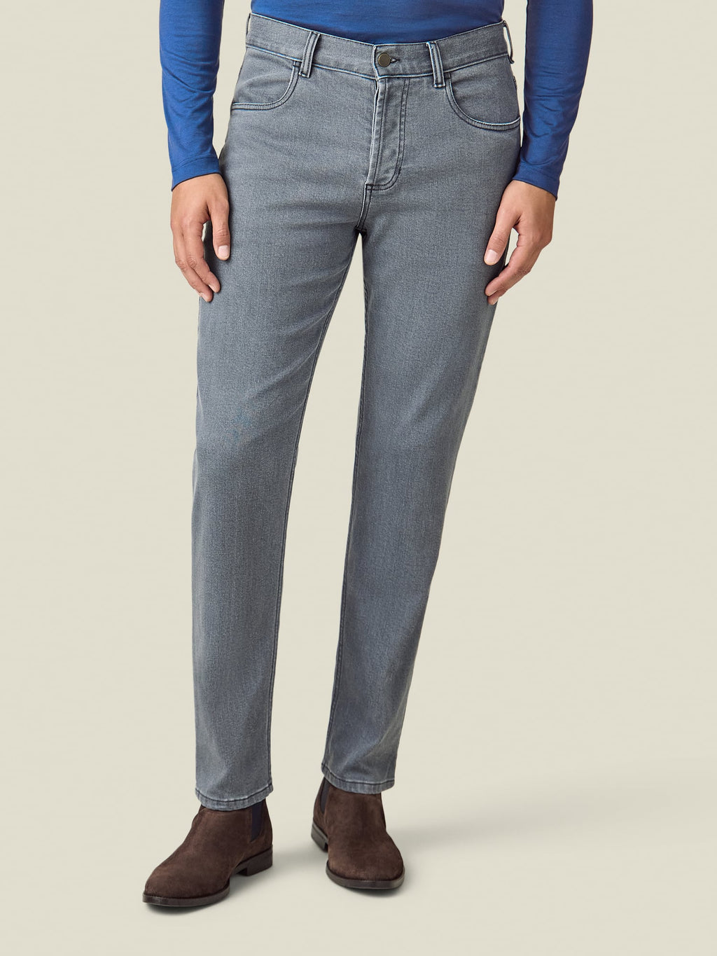 Front view of a model wearing the Luca Faloni Cashmere Denim Jeans in stone grey.
