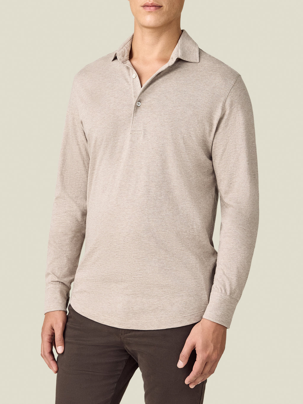 Front view of a model wearing the Luca Faloni Cashmere-Cotton Long Sleeved Polo shirt in Oatmeal with dark trousers.