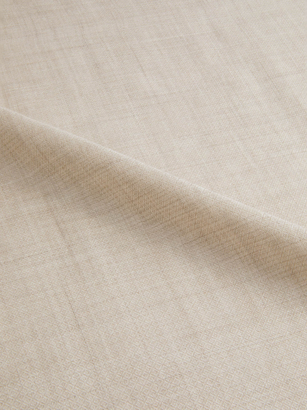 A detailed close-up of the Sand Silk-Cashmere Scarf, showing its intricate micro-diamond weave and soft texture.