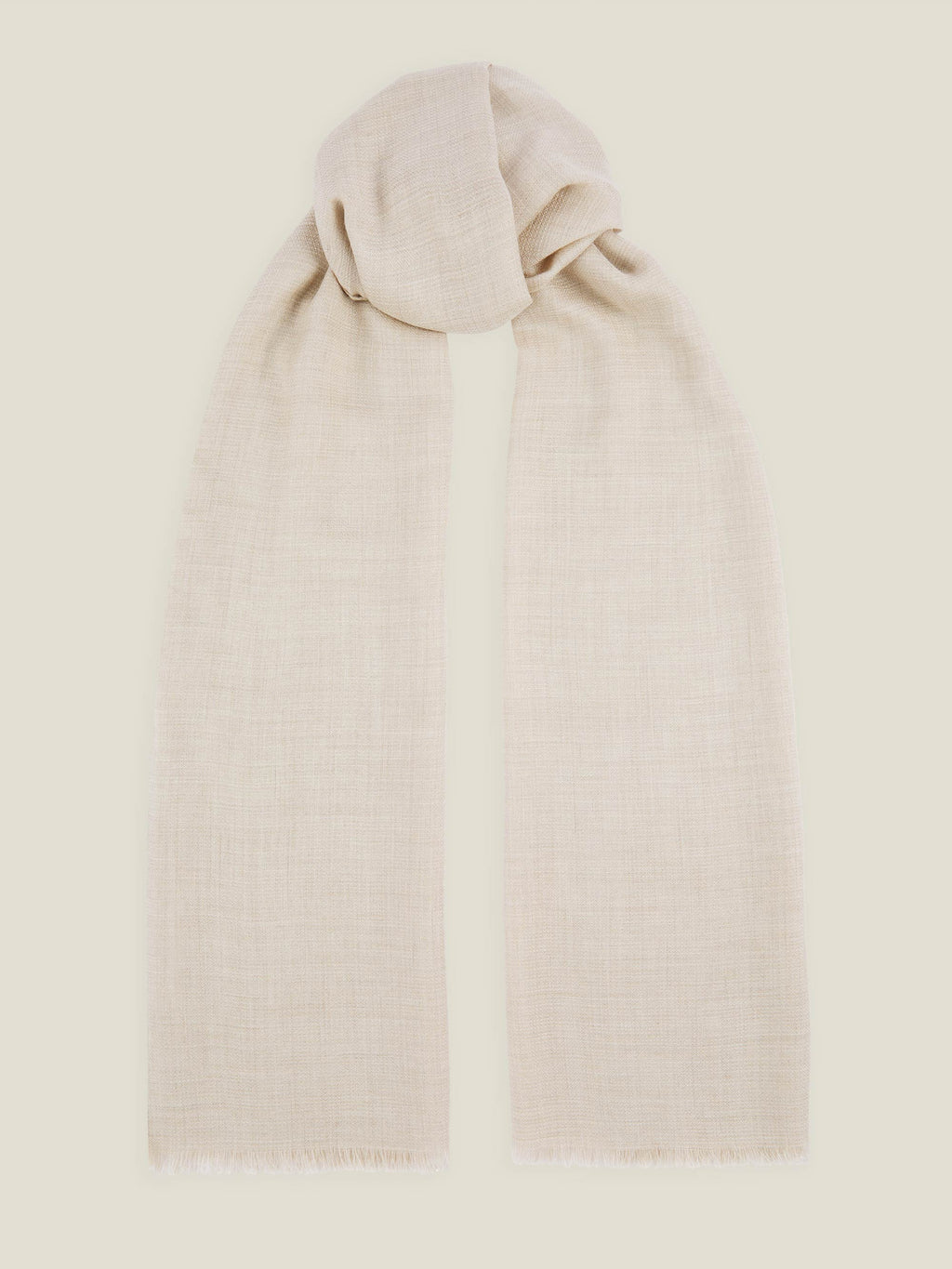 A flat lay of the Luca Faloni Silk-Cashmere Scarf in Sand, tied in a loose knot against a neutral background.