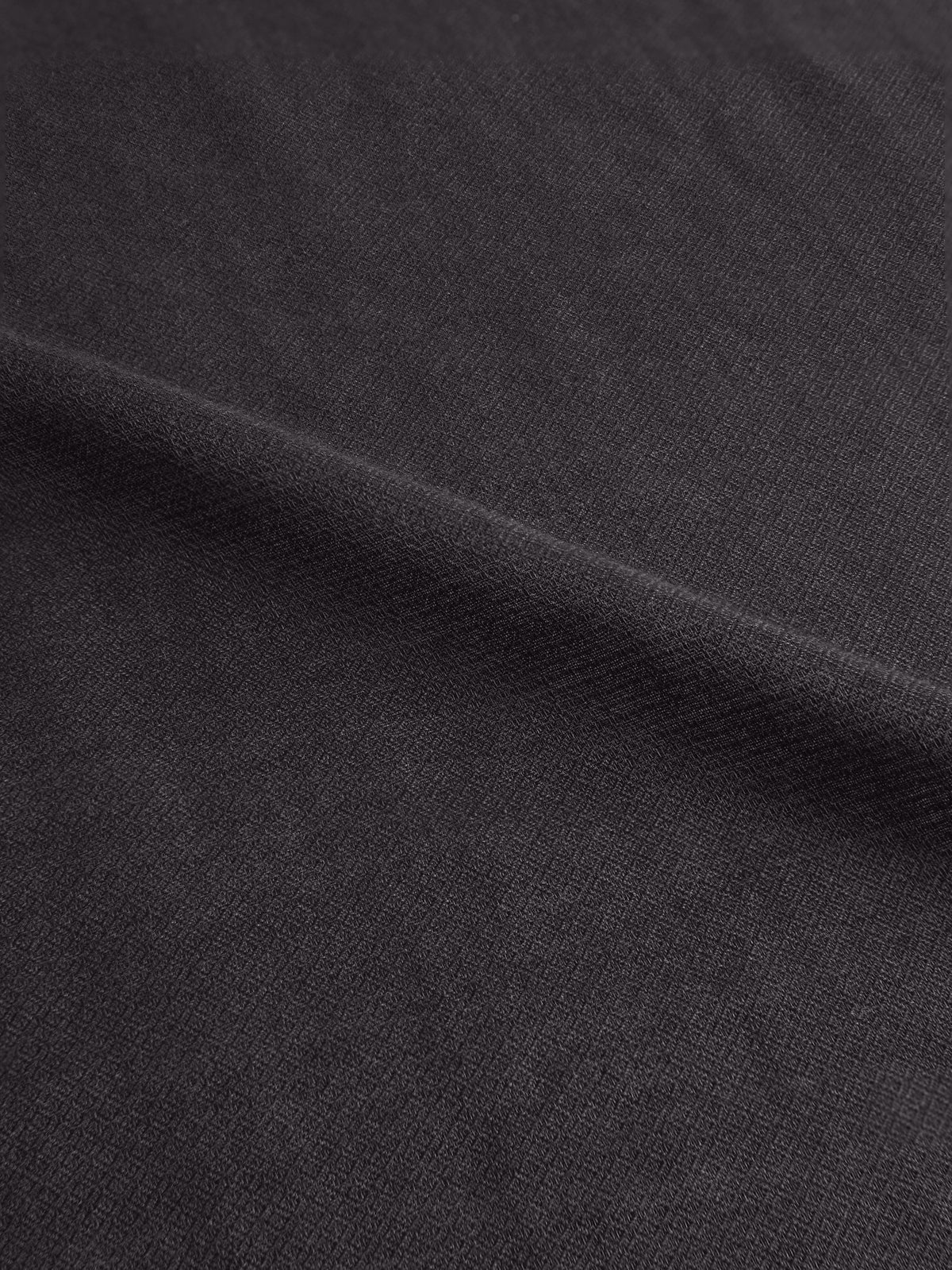 Close-up of the Luca Faloni Silk-Cashmere Scarf in charcoal grey, showing the micro-diamond texture.