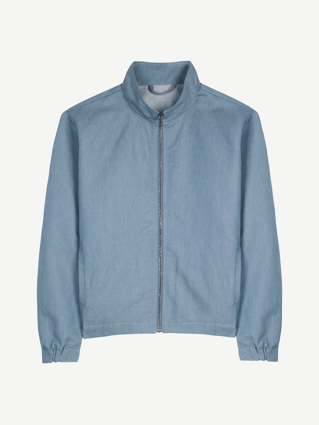 Luca Faloni Linen Bomber Jacket in light blue, seen from the front.