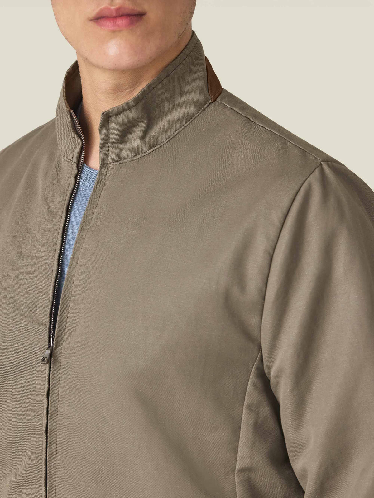 Detail of the Luca Faloni Linen Bomber Jacket in Nocciola Brown, showing the collar with its goatskin suede insert.