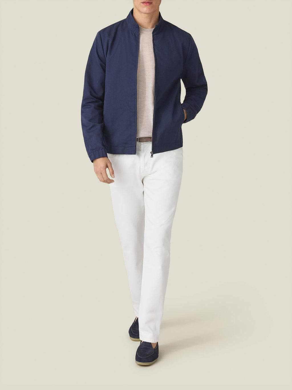 Model wearing the Midnight Blue Linen Bomber Jacket, styled with a light t-shirt, white trousers, and navy loafers.