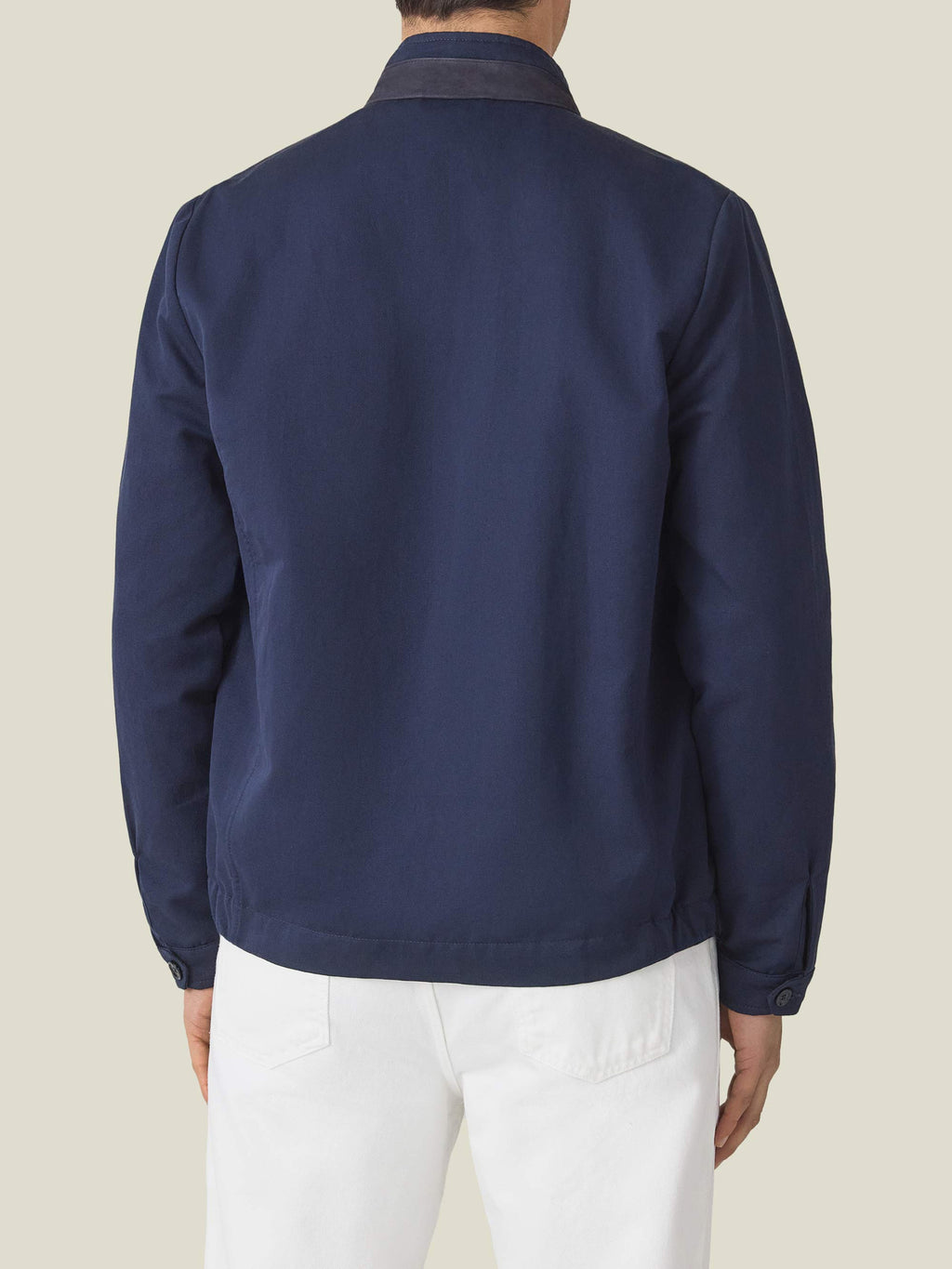 Back view of a model wearing the Midnight Blue Linen Bomber Jacket, highlighting the contrasting suede collar insert.