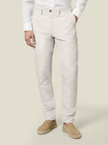 Front view of a model wearing Sand Linen Cotton Trousers, styled with a white shirt and matching espadrilles.