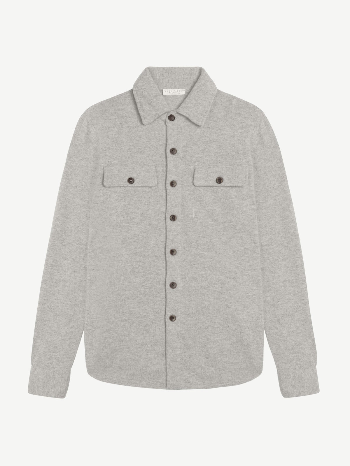 A flat-lay image of the Luca Faloni Cashmere Overshirt in Light Grey, showcasing its spread collar, horn buttons and pockets.