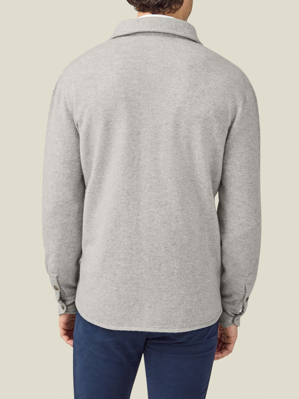 Back view of the Luca Faloni Cashmere Overshirt in Light Grey, showcasing its relaxed cut and soft knit texture.