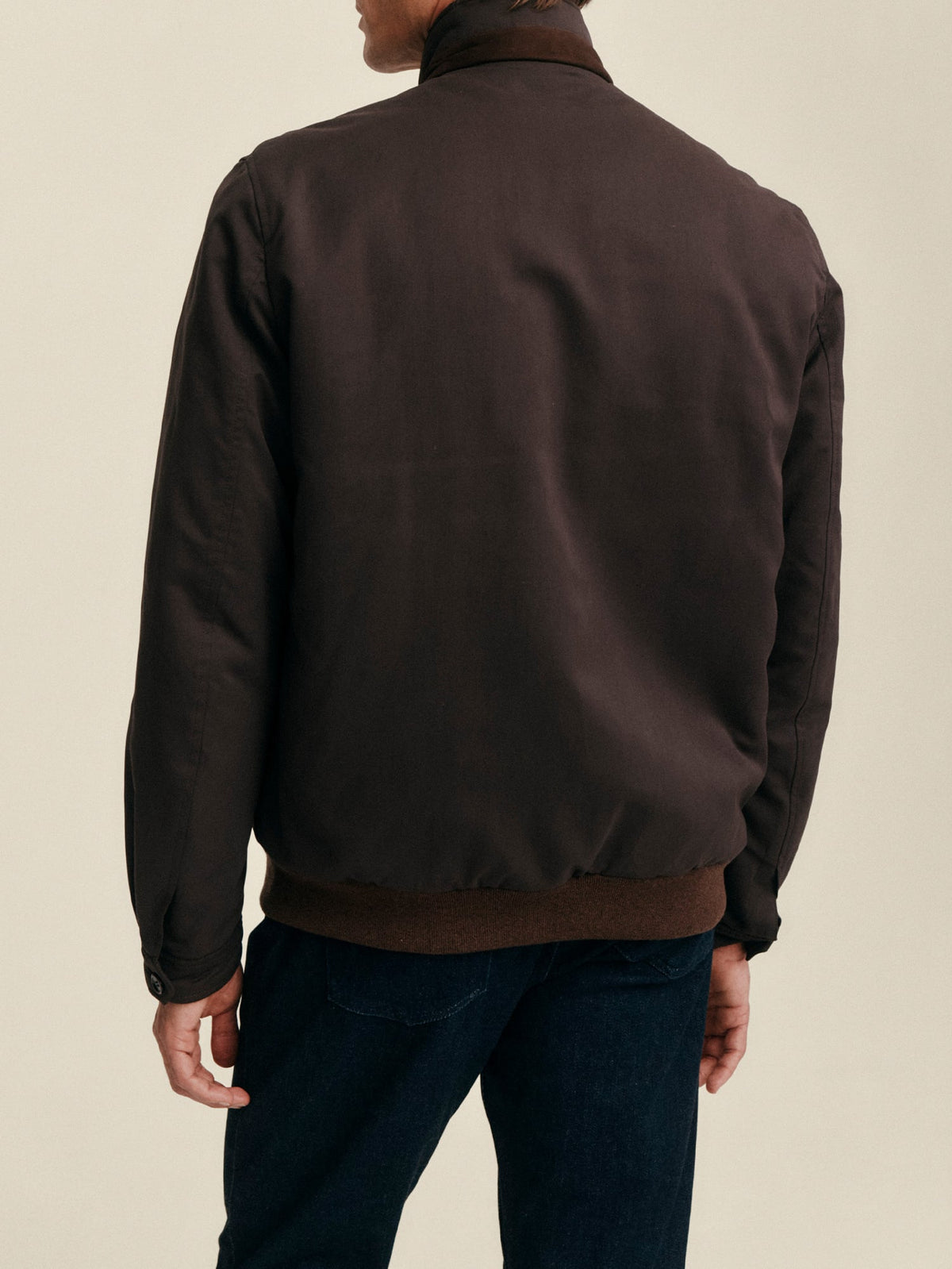 Back view of a model wearing the Luca Faloni City Jacket in Chocolate Brown against a plain background.