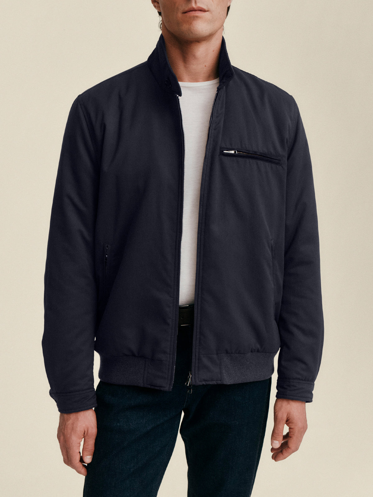 Front view of the Luca Faloni City Jacket in midnight blue, worn by a model against a plain background.